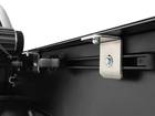 Inside rail view of open tonneau cover with attachment system exposed. 
