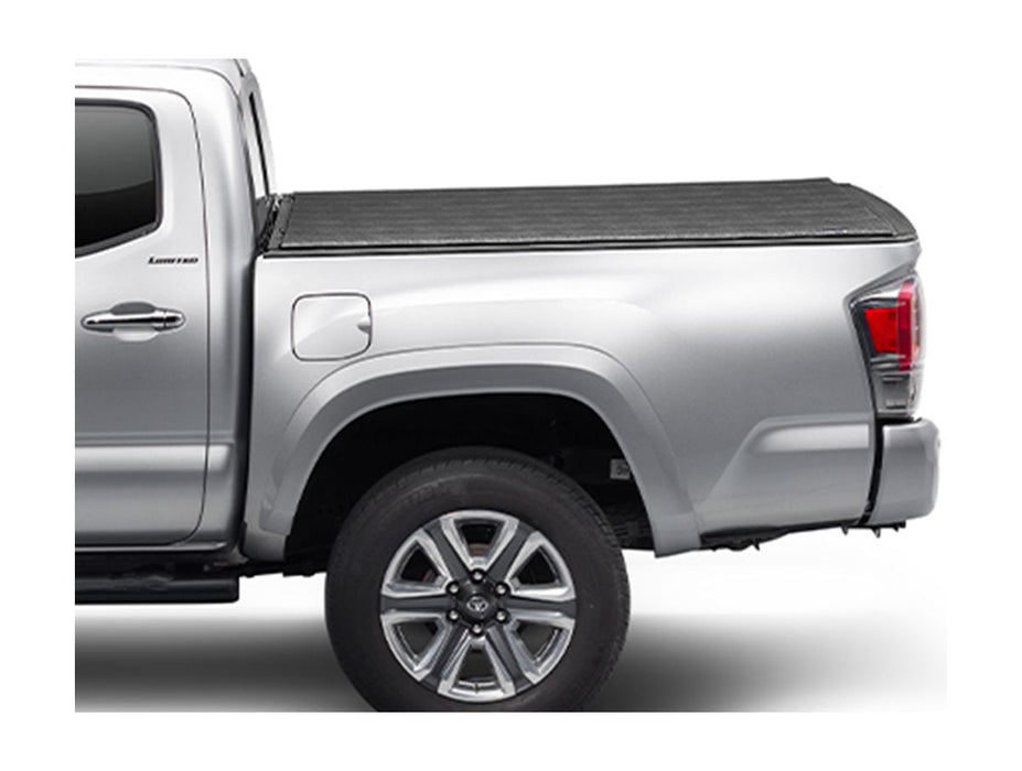 Side profile of a truck with TruXedo Sentry tonneau cover in the closed position. 
