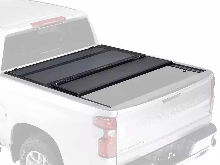 A truck equipped with a black BAKFlip MX4 tonneau cover, highlighting its durable and stylish design.